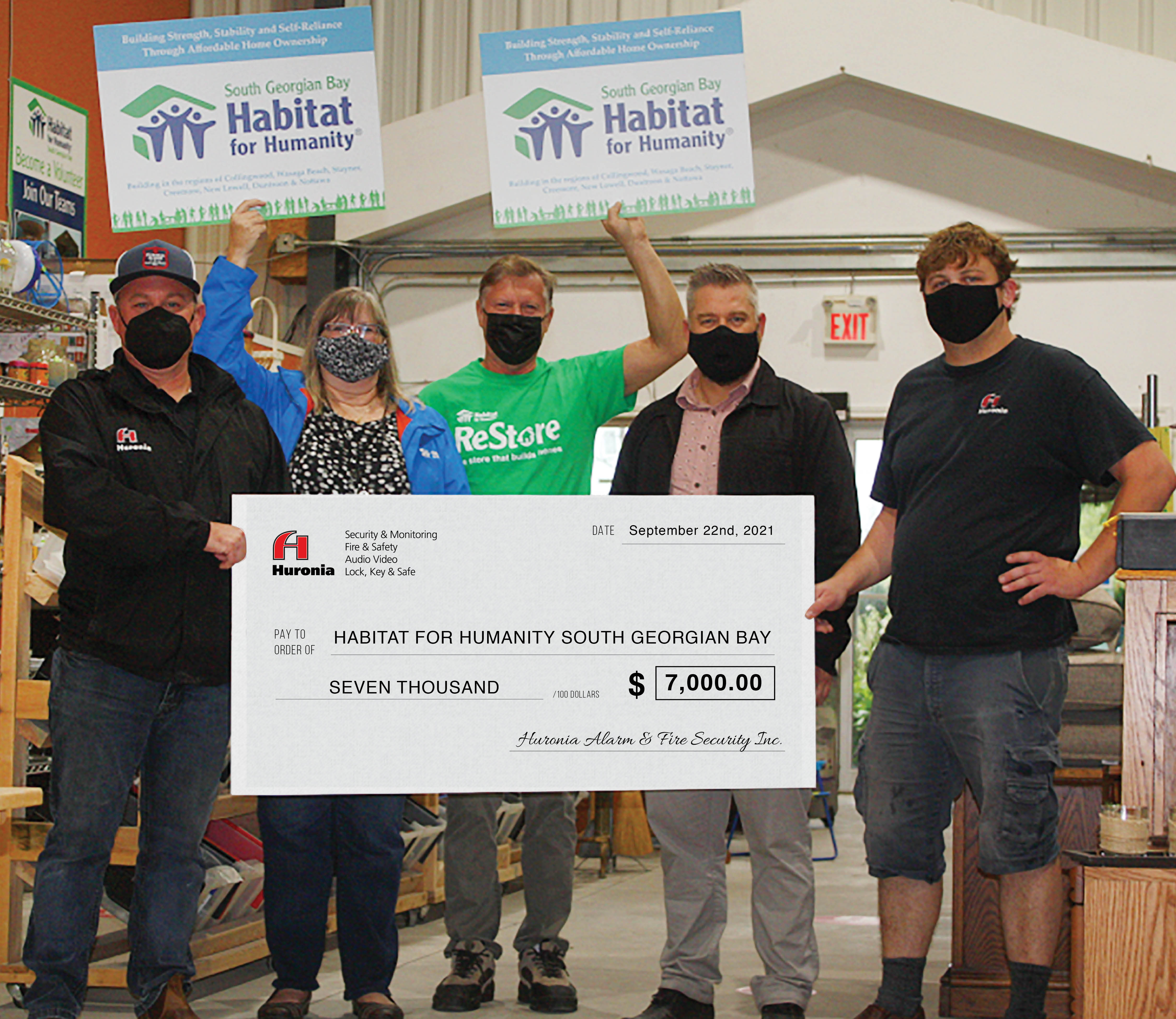 Huronia Alarm & Fire Security Inc. makes donation-in-kind to Habitat for Humanity South Georgian Bay