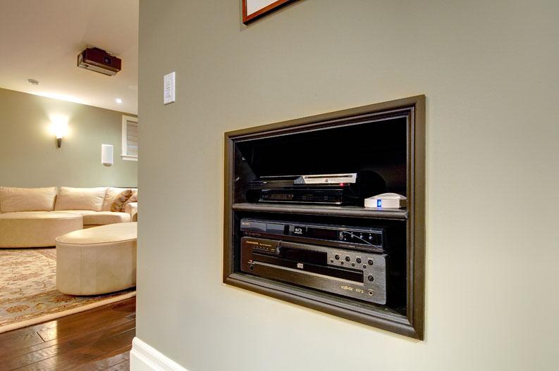 Family room home theatre audio video equipment niche.